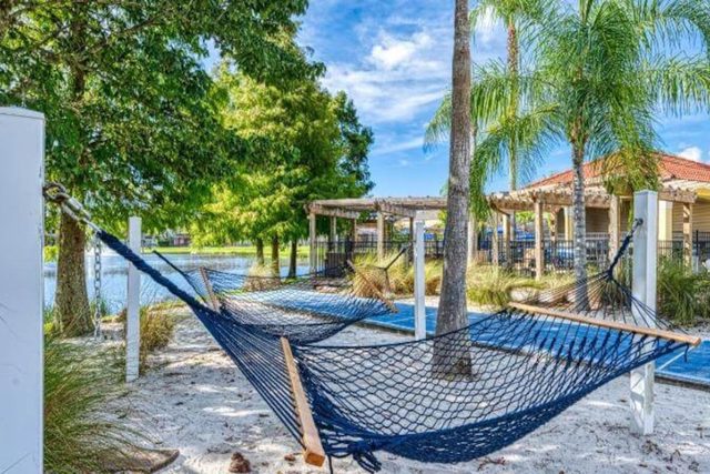 Heroes & Wizards Villa, Included are The lakeside Terra Verde Resort clubhouse and amenities, with large heated swimming pool, hot tub, tiki bar and grill, fitness center, sauna, and more!