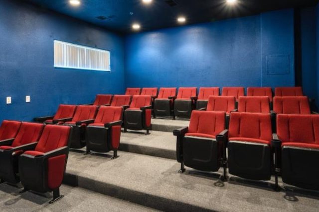 Heroes & Wizards Villa, Movie theater cinema, included at the lakeside Terra Verde Resort clubhouse and amenities, with large heated swimming pool, hot tub, tiki bar and grill, fitness center, playground, basketball court, sauna, and more!