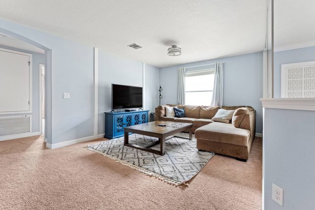 Pixel & Pixie Retreat, Upstairs living room loft with large smart TV