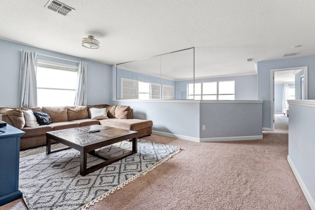Pixel & Pixie Retreat, Upstairs living room loft with large smart TV
