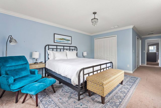 Pixel & Pixie Retreat, Upstairs master bedroom with king size bed, large smart tv and private ensuite bathroom