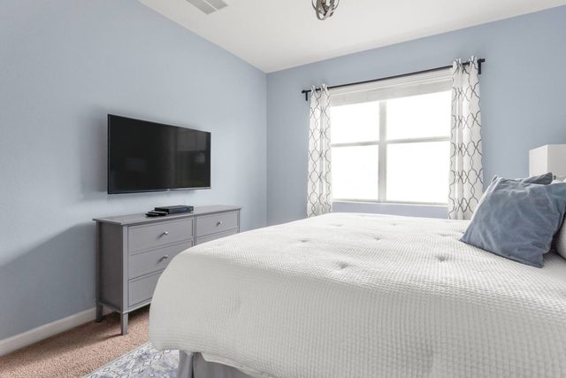 Pixel & Pixie Retreat, Downstairs king bedroom with king size bed, large smart tv.
