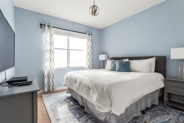 Pixel & Pixie Retreat, Downstairs king bedroom with king size bed, large smart tv.