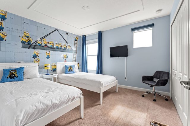 Pixel & Pixie Retreat, Upstairs minions room with two twin beds and smart tv