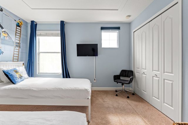 Pixel & Pixie Retreat, Upstairs minions room with two twin beds and smart tv