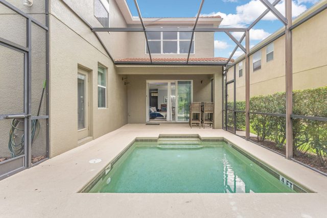 Pixel & Pixie Retreat, Private pool deck with comfortable seating, lounge chairs, and dining table.