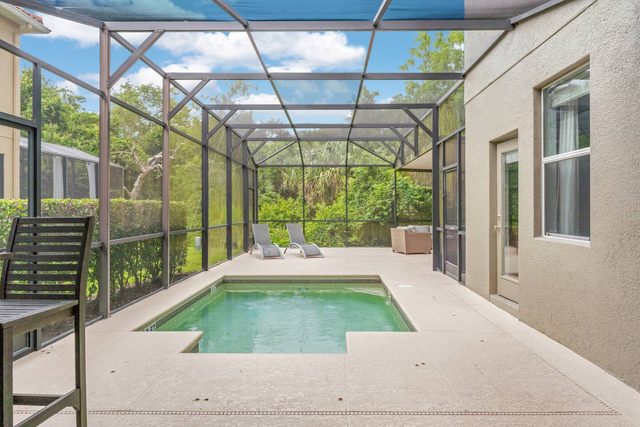 Pixel & Pixie Retreat, Private pool deck with comfortable seating, lounge chairs, and dining table.