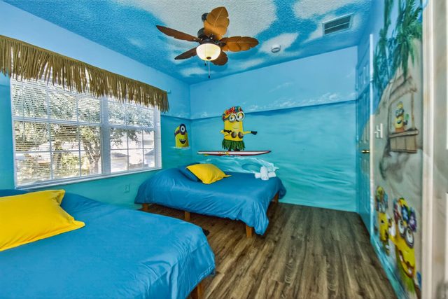 Wonderlands & Wizards Villa, The Minions Beach Party Room with two Full Size beds (Shared bathroom)
