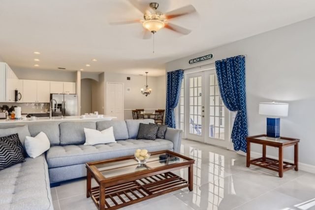 The Marvel Mansion, Open living room with smart tv connected to kitchen and dining room