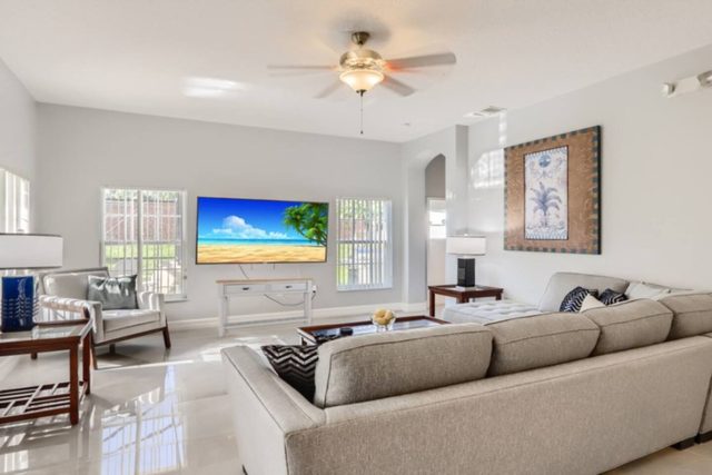 The Marvel Mansion, Open living room with smart tv connected to kitchen and dining room