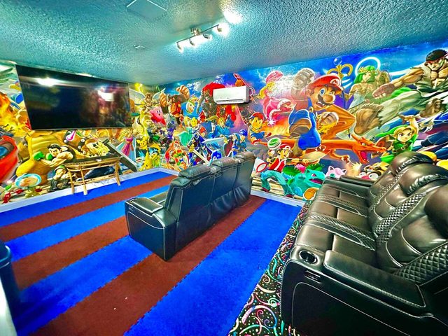 The Marvel Mansion, The Smash Brothers game room and theater! Featuring a pool table, foosball, large smart tv and movie theater reclining chairs!