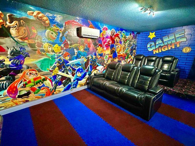 The Marvel Mansion, The Smash Brothers game room and theater! Featuring a pool table, foosball, large smart tv and movie theater reclining chairs!