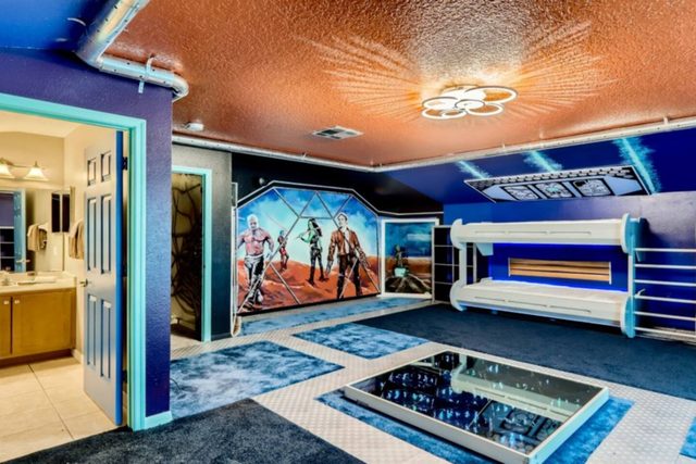 The Marvel Mansion, Guardians of The Galaxy Starship Room with six twin bunk beds and private bathroom, with large smart tv and gaming console