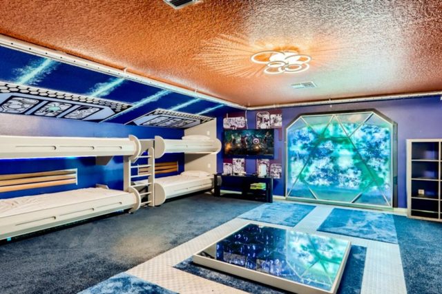The Marvel Mansion, Guardians of The Galaxy Starship Room with six twin bunk beds and private bathroom, with large smart tv and gaming console