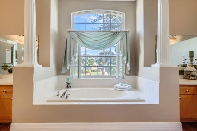 The Marvel Mansion, Master bathrooms with tub and standalone shower and two vanities