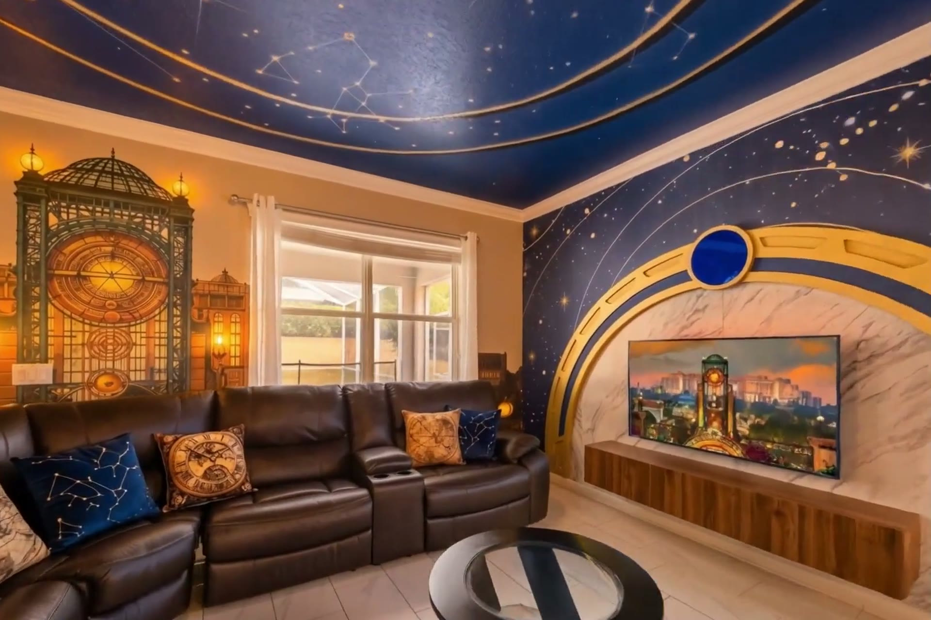 A Storybook themed villa great room under a celestial mural