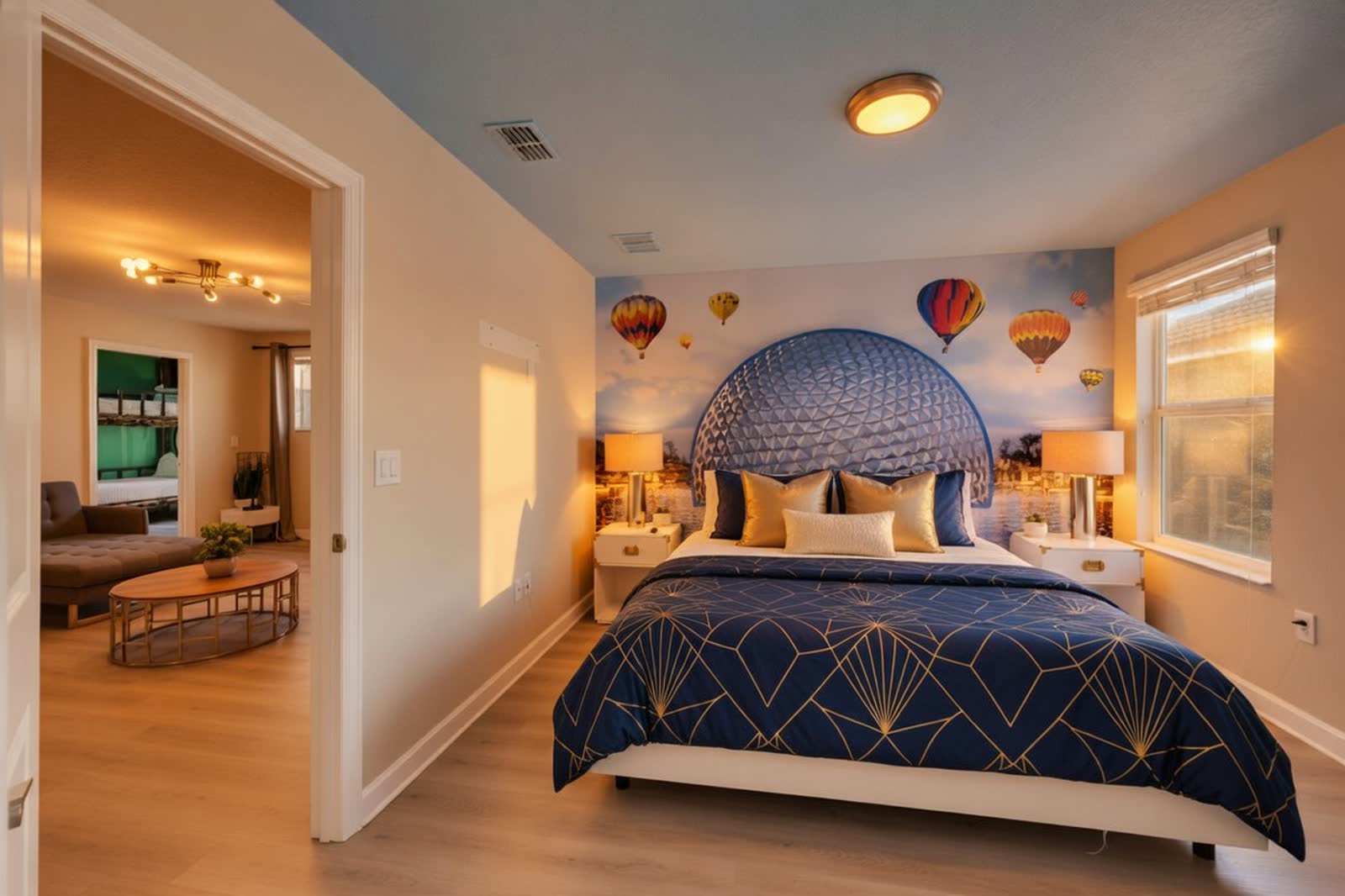 A canopied bed in a themed Storybook villa suite, dressed for a celebration